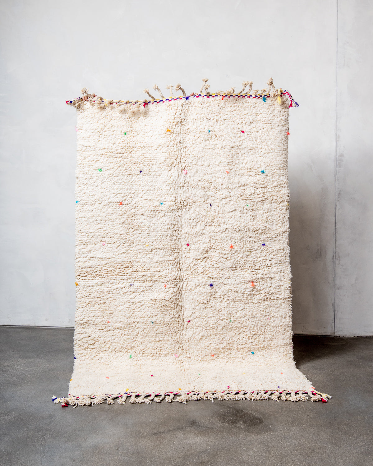 Modern, designer, handcrafted Berber rug from Morocco. Beniourain carpet with beautiful colours and patterns and fluffy wool texture.